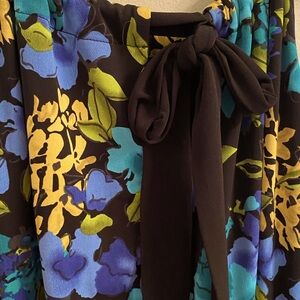 Floral sundress is the perfect dress to pack for your beach trip. Apt 9 XL